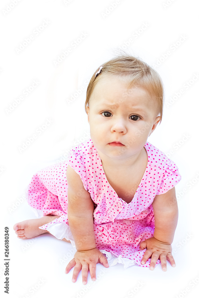 Happy beautiful little girl baby on a white background Happy beautiful little girl baby on a white background