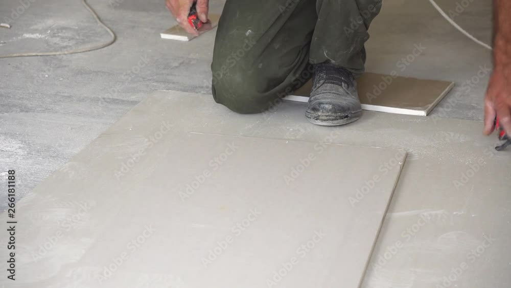drywall cutting close up, worker cuts drywall with wallpaper knife drywall cutting close up, worker cuts drywall with wallpaper knife