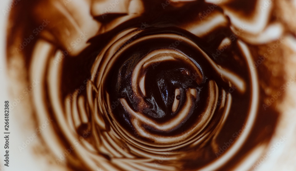 Abstract background. Remains of hot chocolate on the white walls of the cup. Abstract background. Remains of hot chocolate on the white walls of the cup.