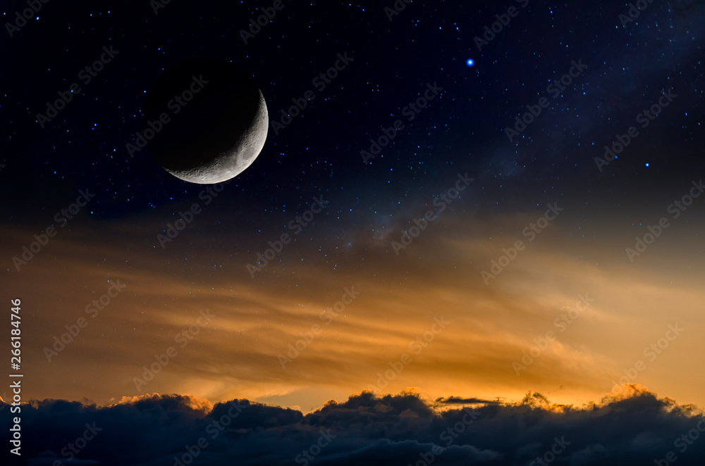 Sunset with moon and stars