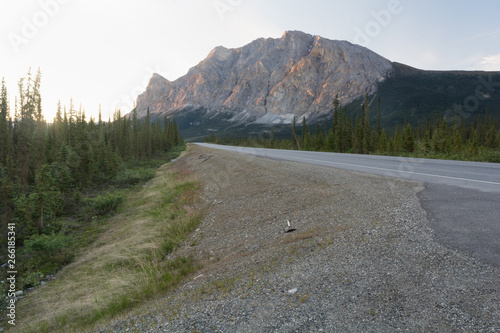 Midnight sunlight shines on a mountain bordering the Dalton Highway in Brooks Mountain Range in far northern Alaska
