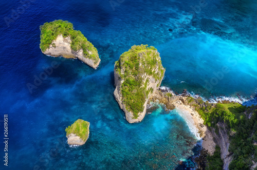 Aerial view at sea and rocks. Turquoise water background from top view. Summer seascape from air. Summer adventure. Travel - image