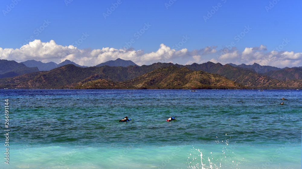 Obraz premium View to Lombok across the sea from Gili Trawangan Island, Indonesia