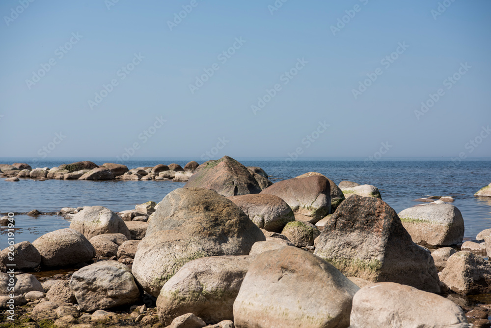 Stones balance on the beach. Place on Latvian coasts called Veczemju klintis