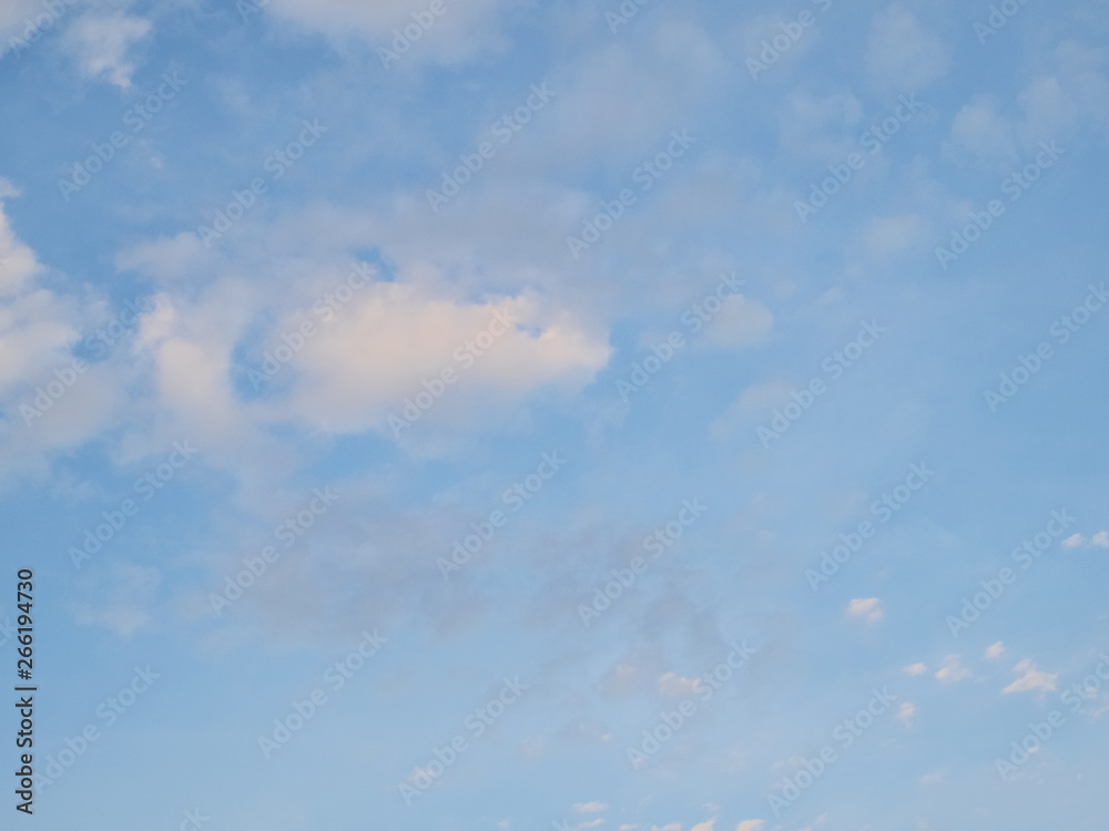 Ant't eye view of many white clouds moving with blue sky background. Ant't eye view of many white clouds moving with blue sky background.