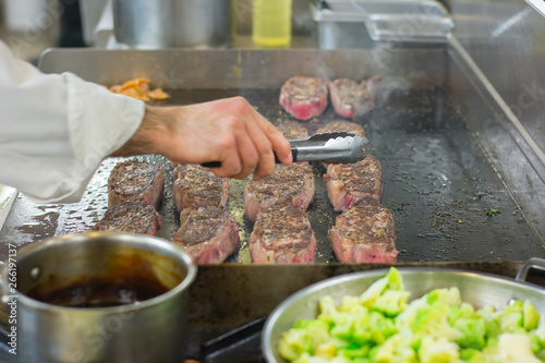 chef preparing food in kitchen