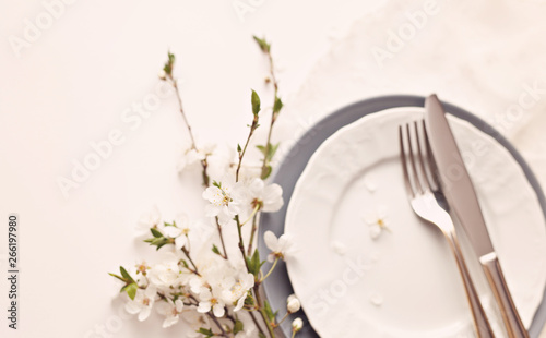 Spring table setting with flowers