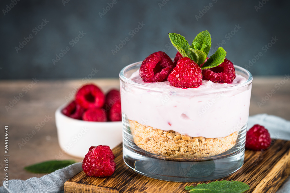 No baked cheesecake with raspberry in glass jar. No baked cheesecake with raspberry in glass jar.