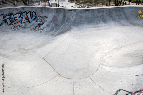 skatepark made of concrete with graffiti