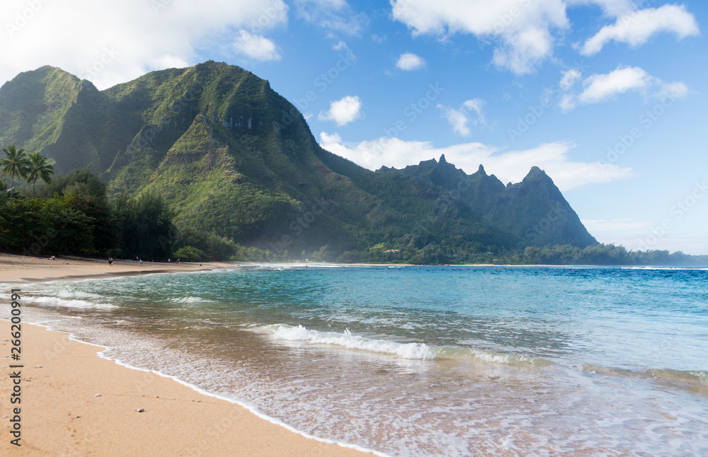 View down the sand at Tunnels Beach in winter on Hawaiian island of Kauai on North Shore