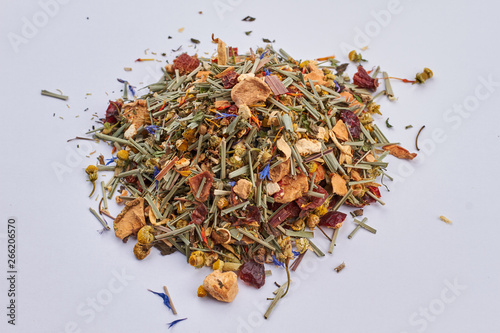 Heap of herbal tea close up. Mixed organic tea on white background. Healthy and delicious drink.