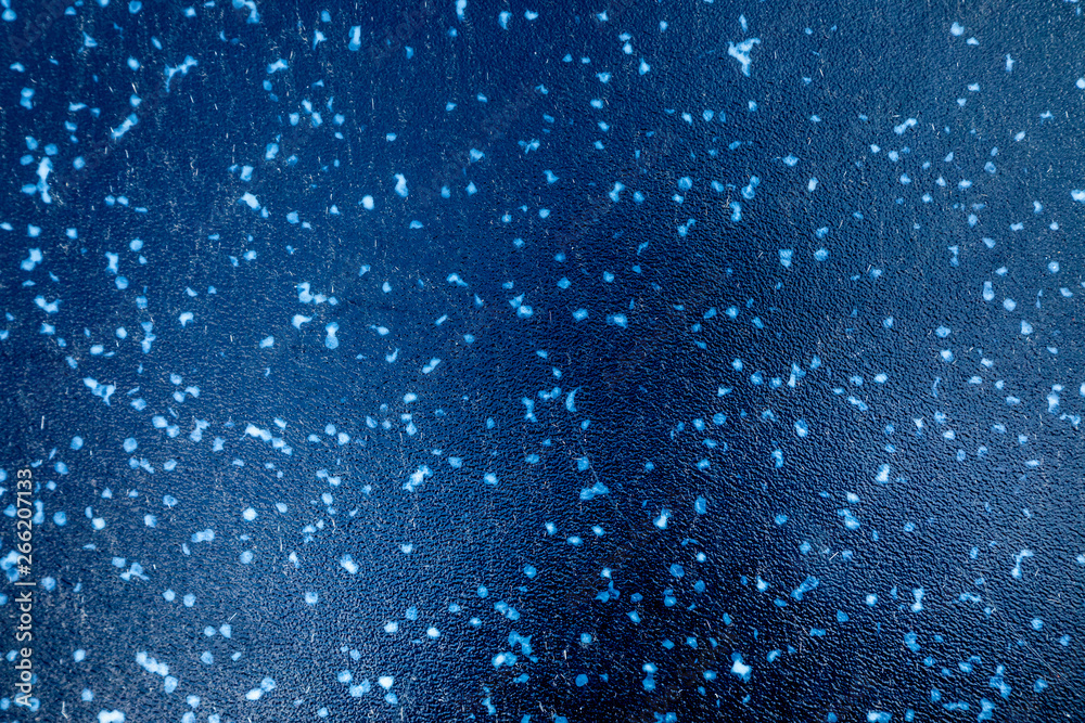 Naklejka premium Weathered and scratched black and blue metal