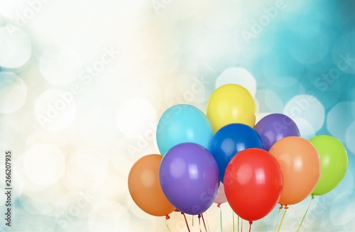 Bunch of colorful balloons on background