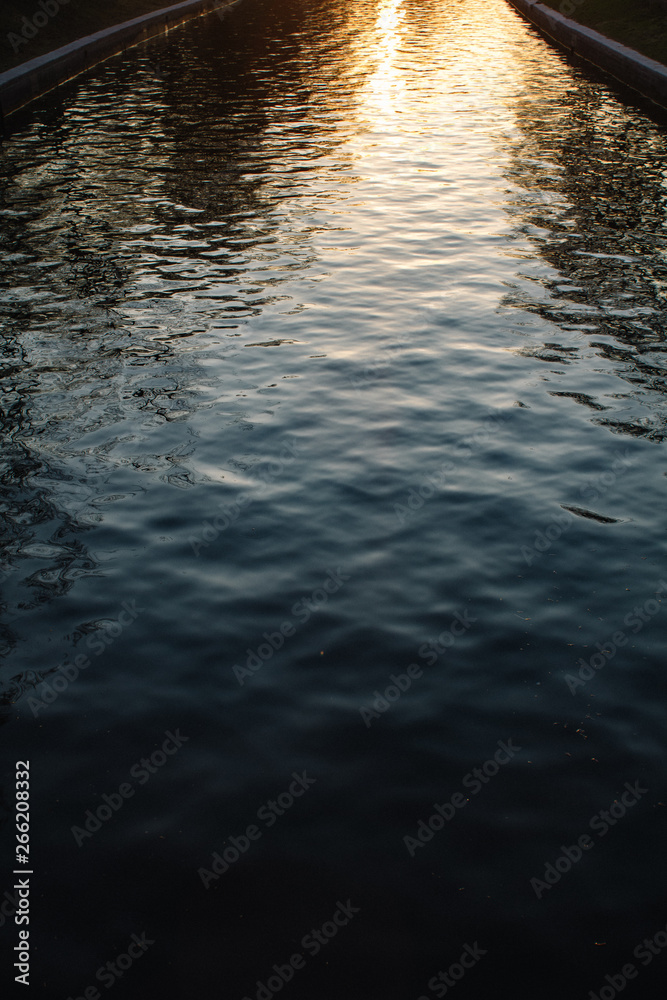 wonderful landscape texture of golden sunset on the surface of the river wonderful landscape texture of golden sunset on the surface of the river