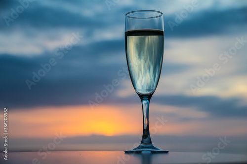 Champagne wine glass at sunset