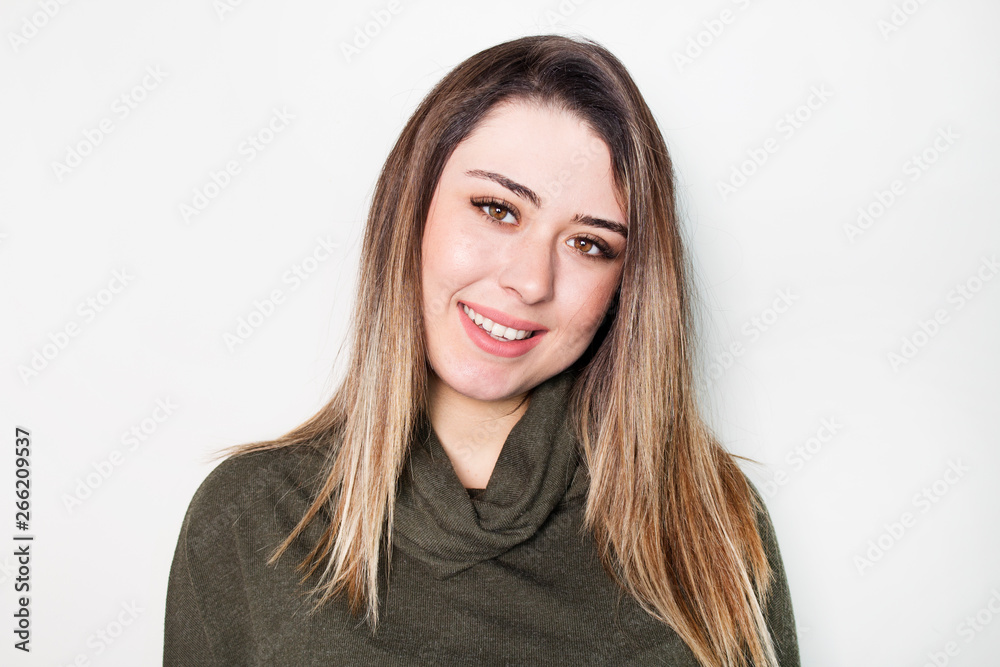 Portrait of young beautiful cute attractive girl looking at camera over white background. Portrait of young beautiful cute attractive girl looking at camera over white background.
