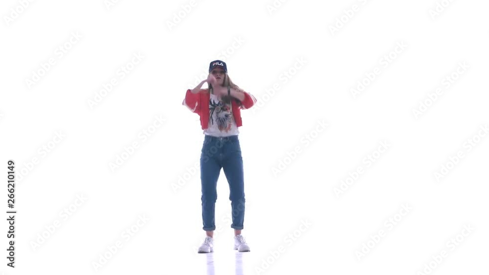 Young beautiful girl dancing hip-hop, street dancing on white background, isolated Young beautiful girl dancing hip-hop, street dancing on white background, isolated