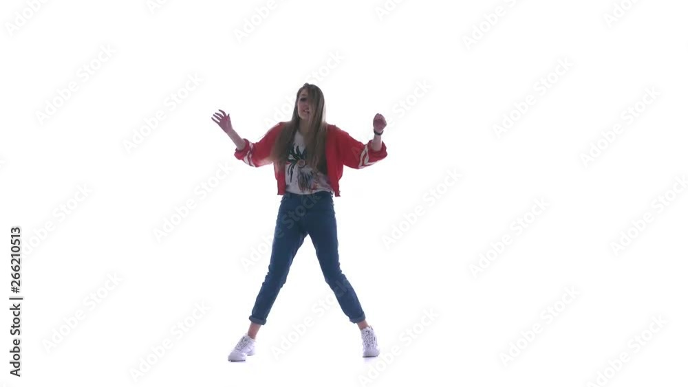 Young beautiful girl dancing hip-hop, street dancing on white background, isolated Young beautiful girl dancing hip-hop, street dancing on white background, isolated