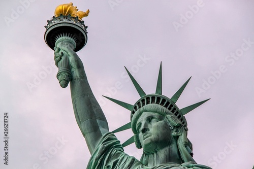 Nice view on isolated Statue of Liberty New York. Beautiful backgrounds.   © Alex