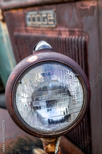 Close up of weathered Dodge truck headlight
