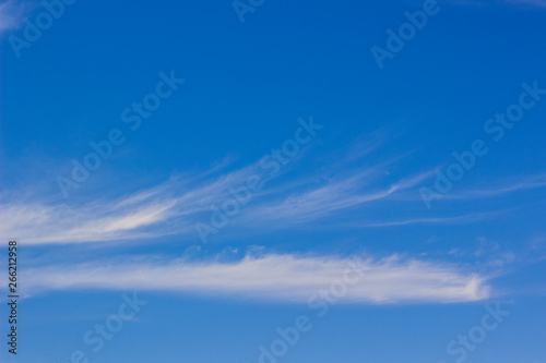 vivid blue sky nature background with white high clouds 