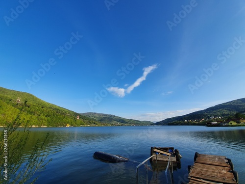 Lake in the Polish mountains on sunny day, Miedzybrodzie Bialskie, Poland