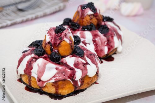 Papanasi - romanian specialty. Papanasi - a traditional romanian dessert  photo