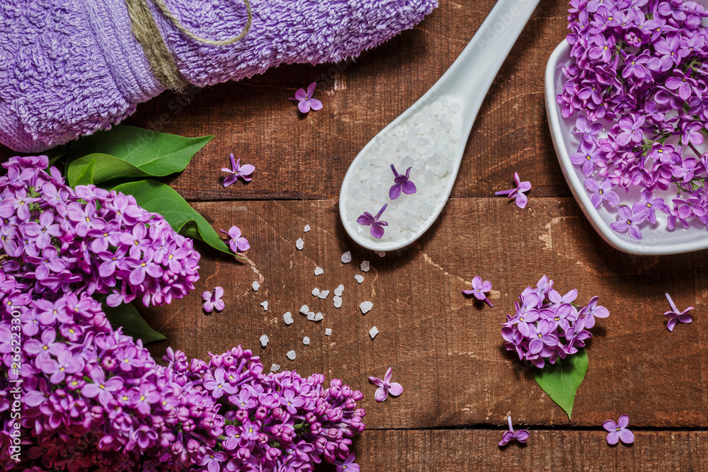 Aromatherapy, wellness and spa with lilac flowers Aromatherapy, wellness and spa with lilac flowers