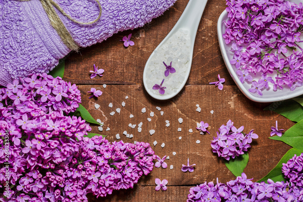 Aromatherapy, wellness and spa with lilac flowers Aromatherapy, wellness and spa with lilac flowers