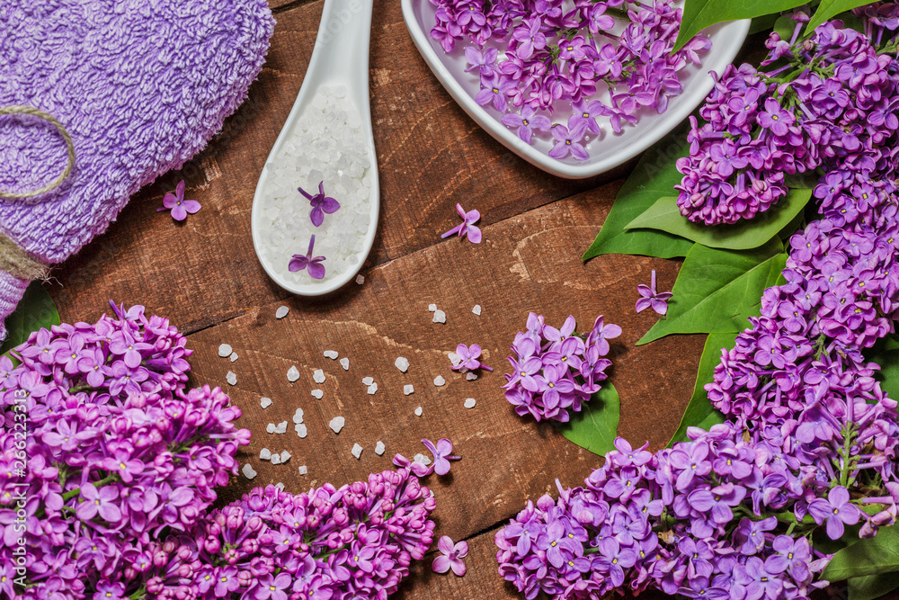 Aromatherapy, wellness and spa with lilac flowers Aromatherapy, wellness and spa with lilac flowers