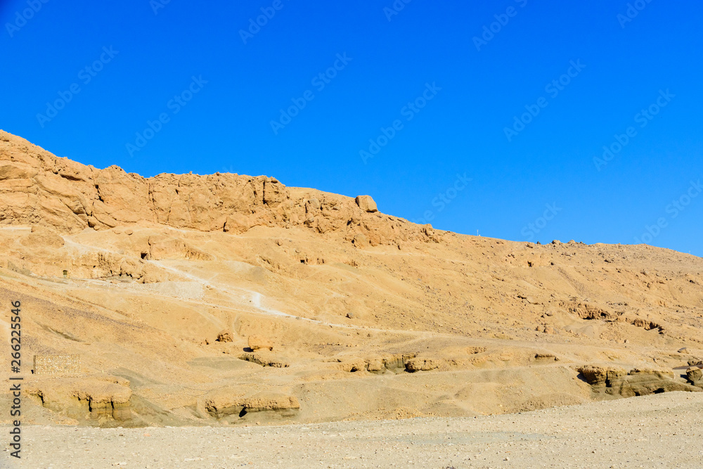 Сliffs near the temple of Hatshepsut in a Luxor, Egypt Сliffs near the temple of Hatshepsut in a Luxor, Egypt