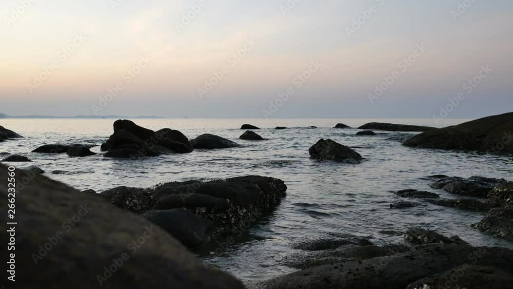 Calm in the morning by the beach rock and sea Calm in the morning by the beach rock and sea