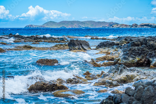 Ocean surf on the rocky beach