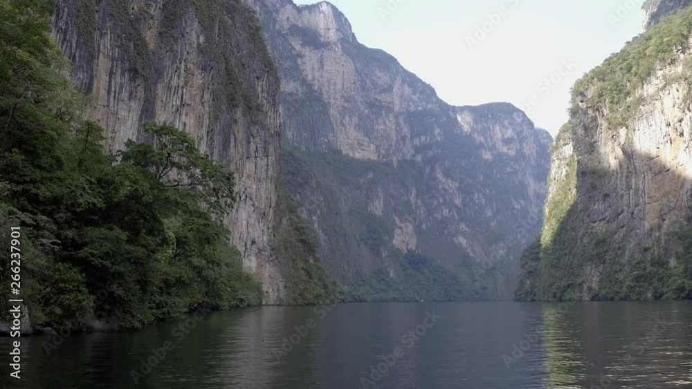 Aerial cinematic shot of the Grijalva river in the Sumidero Canyon, Chiapas Mexico Aerial cinematic shot of the Grijalva river in the Sumidero Canyon, Chiapas Mexico