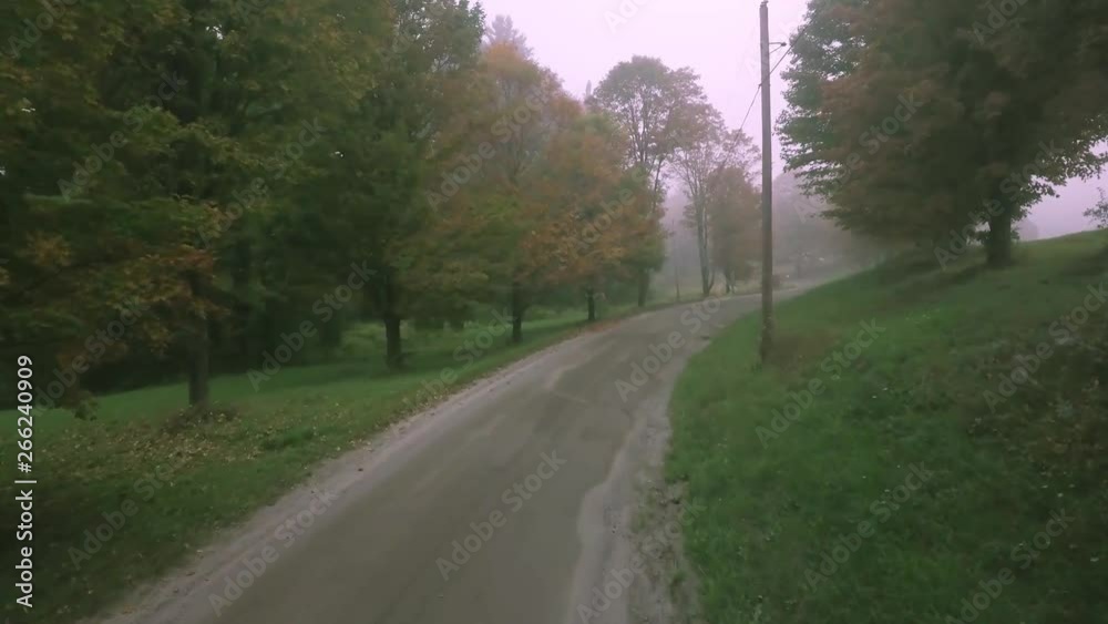 Awesome aerial view on a foggy dirt road in the northeast kingdom via drone Awesome aerial view on a foggy dirt road in the northeast kingdom via drone