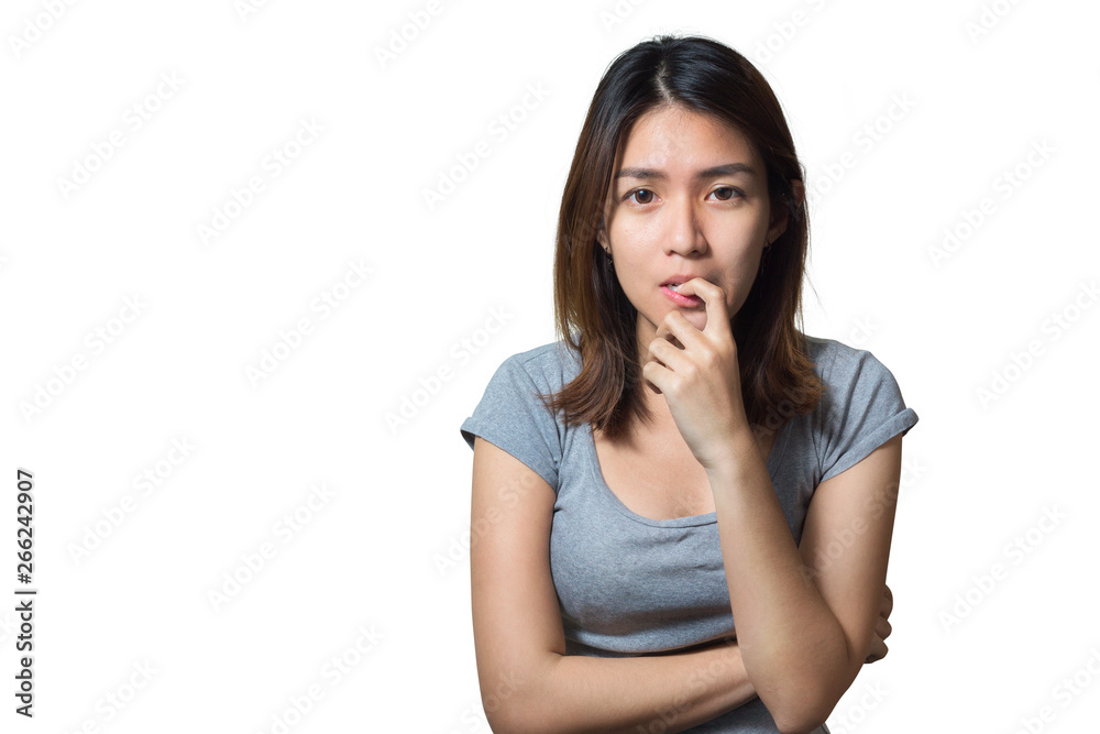 Young asian woman worry in gray t-shirt biting her nails isolated on white background, Emotion concept. Young asian woman worry in gray t-shirt biting her nails isolated on white background, Emotion concept.