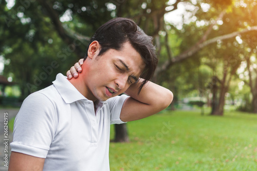Young man asian have accident Neck pain in sport exercise jogging, Exercise and healthy concept, Selective focus