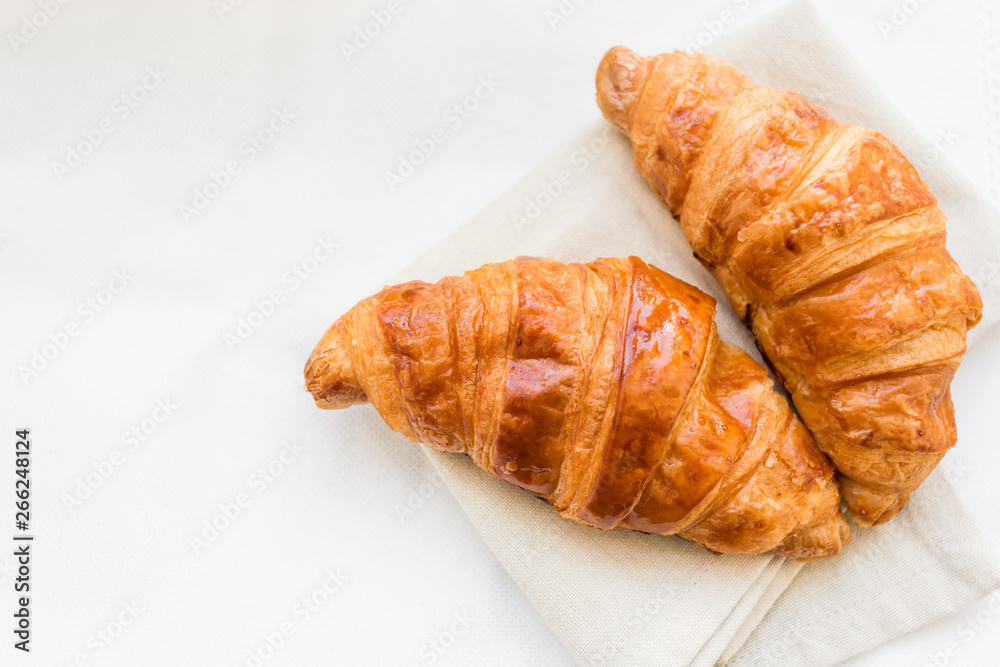 croissants on white floor croissants on white floor