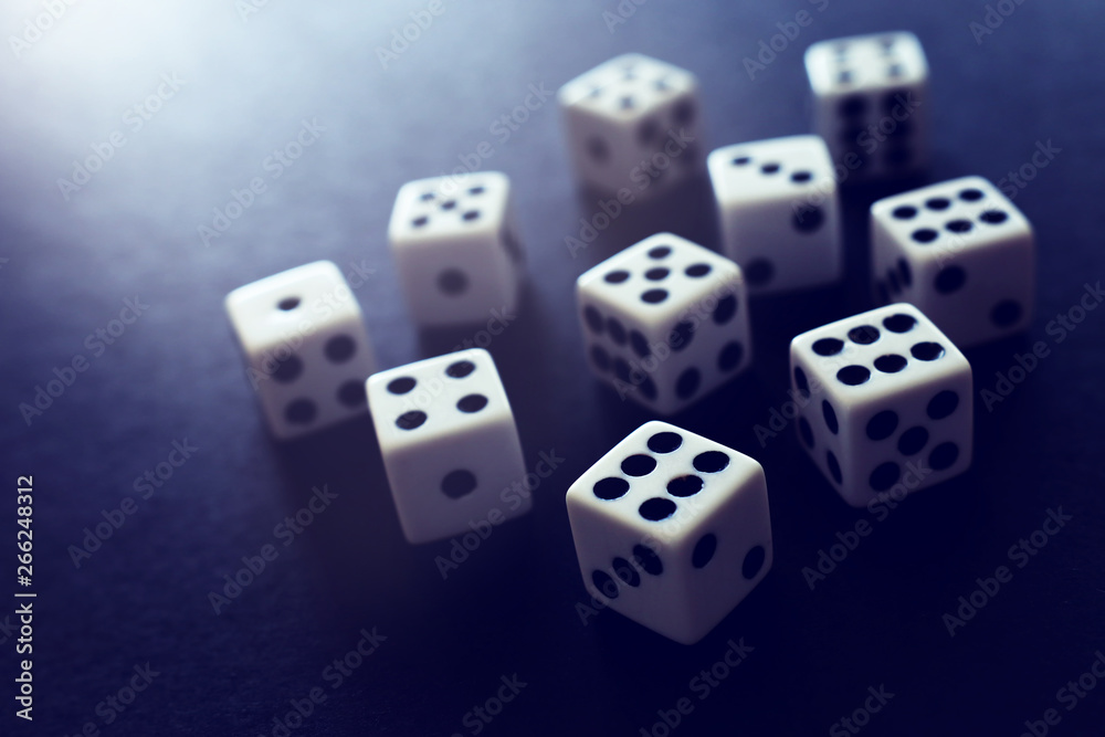 Rolling Dices over black background. Casino gambling concept Rolling Dices over black background. Casino gambling concept