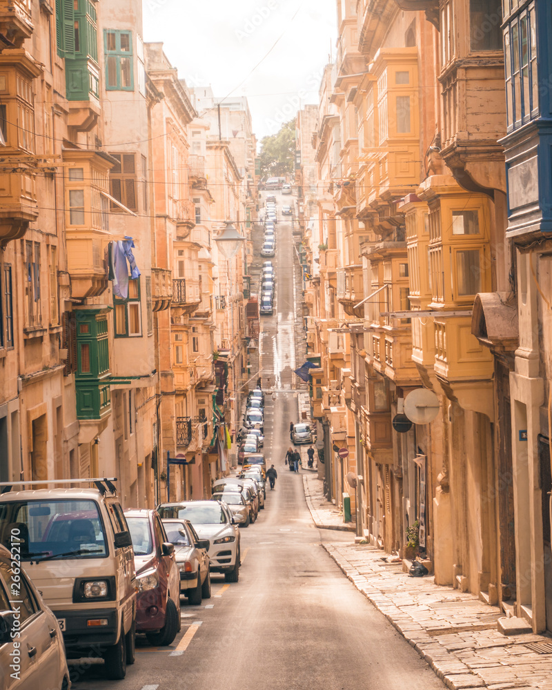 Curved narrow streets of Valletta, Malta. Mediterranean architecture 