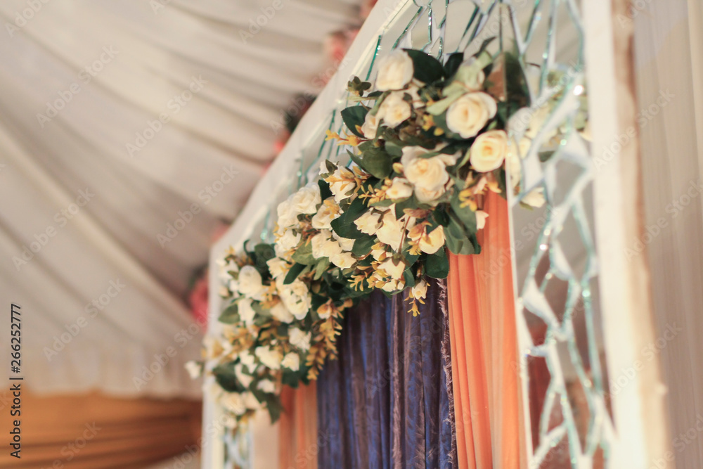 Close-up and selective focus of artificial flower use as wedding dais decoration. Wedding dais also known as Close-up and selective focus of artificial flower use as wedding dais decoration. Wedding dais also known as