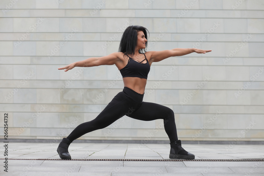 young strong muscular girl doing exercises young strong muscular girl doing exercises