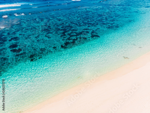 Beautiful tropical beach with blue ocean, aerial view