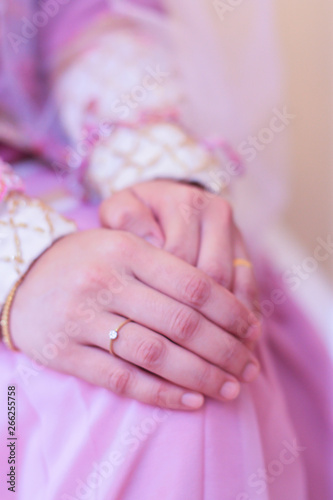 woman hand with fashion diamond rings on the fingers background.