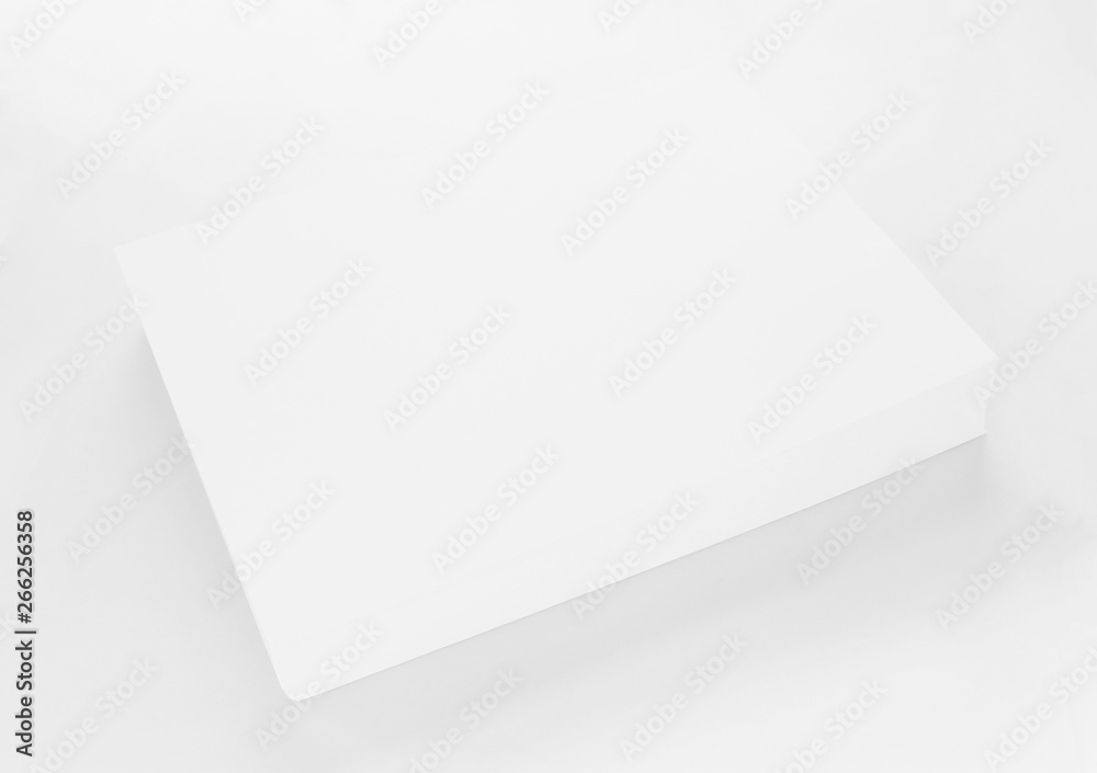 A4 blank paper stack with soft shadows isolated on white background A4 blank paper stack with soft shadows isolated on white background