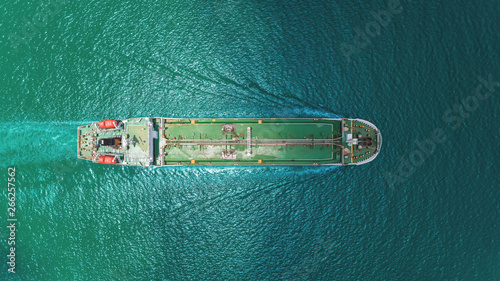 Aerial top view Oil ship tanker transportation oil from refinery on the sea. photo