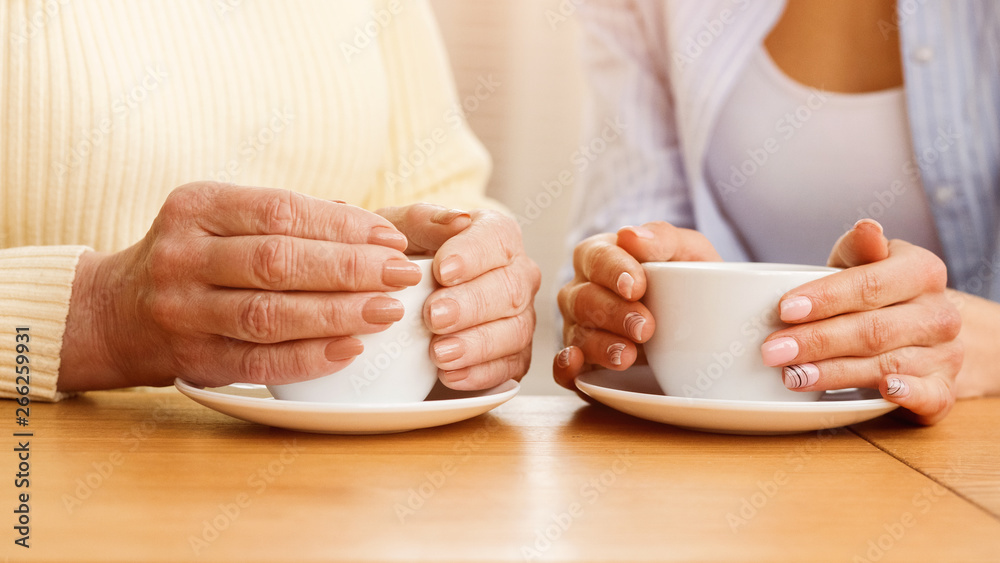 Coffee time. Mother and daughter drinking tea Coffee time. Mother and daughter drinking tea