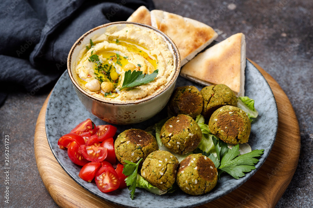 Falafel, hummus and pita bread appetizer. Arabian or vegetarian cuisine Falafel, hummus and pita bread appetizer. Arabian or vegetarian cuisine