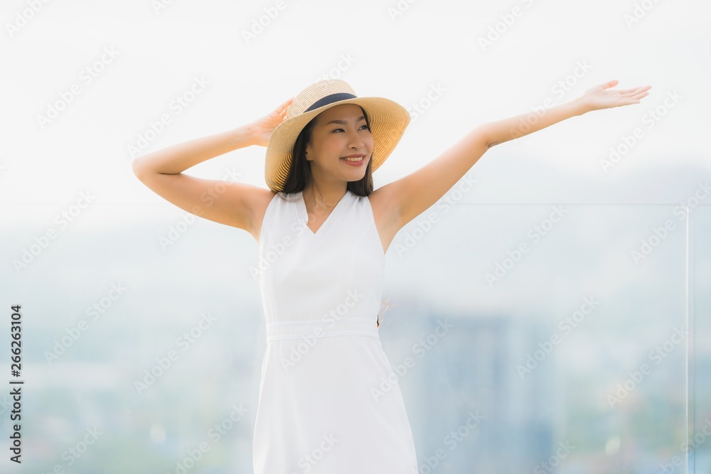 Portrait beautiful young asian woman smile happy and feel free with outdoor background Portrait beautiful young asian woman smile happy and feel free with outdoor background