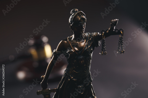 Judje gavel and statue of Justice isolated